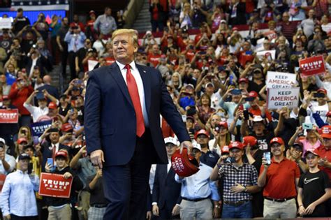 Before the rally, jason lovingshimer, 33, of sunrise, wore a white trump cowboy hat with an american flag print beneath the brim and american flag print shorts. Trump rails against impeachment at Florida 'homecoming ...