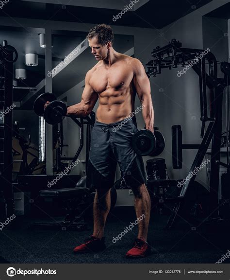 Shirtless Man Doing Biceps Workout Stock Photo By ©fxquadro 133212776
