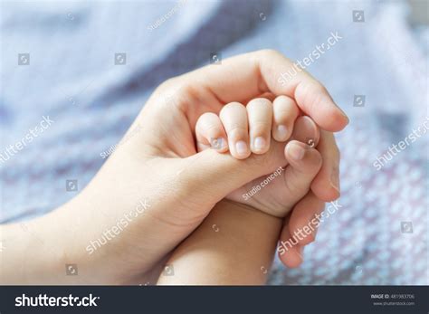 216224 Mother Baby Holding Hand Images Stock Photos And Vectors