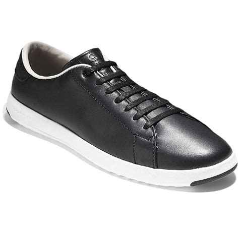 Smooth leather with suede detail. Cole Haan Grandpro Tennis Womens Trainers | Charles Clinkard