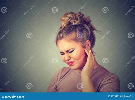 Tinnitus Sick Woman Having Ear Pain Touching Her Painful Head Stock