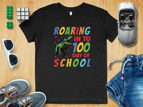 Kids Dinosaur 100th Day Of School T Shirt Fun Roaring Dino Graphic Tee