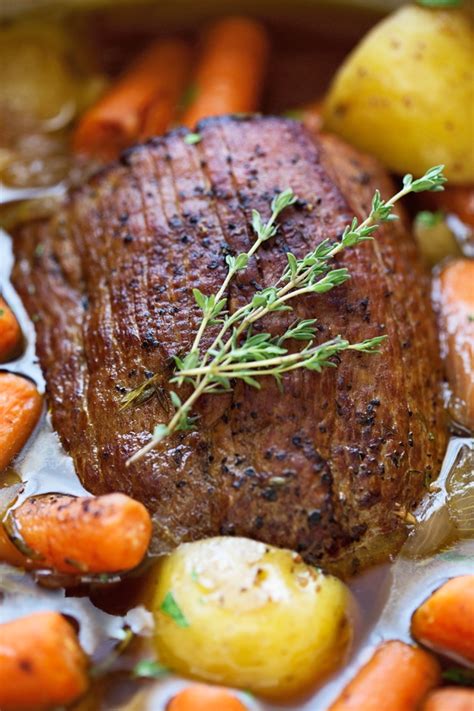 After searing the beef and quickly sautéing the onions, the meat is slowly simmered on the stovetop. Best Ever Pot Roast with Carrots and Potatoes Recipe | Little Spice Jar