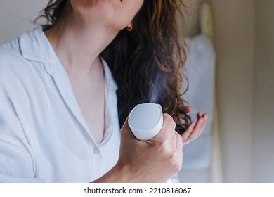 Woman Spraying Her Hair Water Form Stock Photo 2210816067 Shutterstock