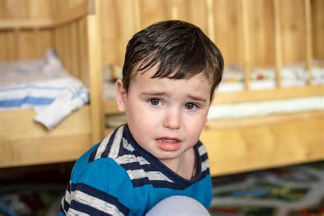 Premium Photo Little Baby Boy Sad In The Nursery