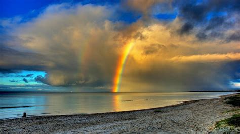 Rainbow On The Beach