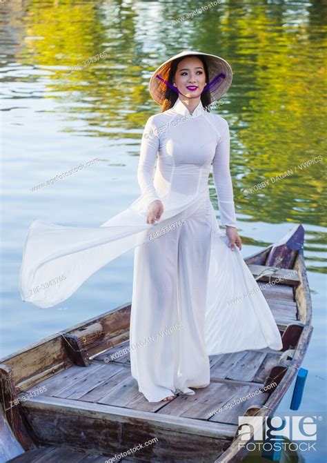 Vietnamese Woman Wearing Ao Dai Dress During The Mid Autumn Festiaval In Hoi An Vietnam Stock