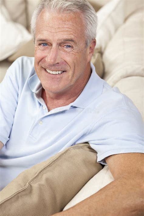 Happy Handsome Senior Man Smiling At Home Stock Photography Image