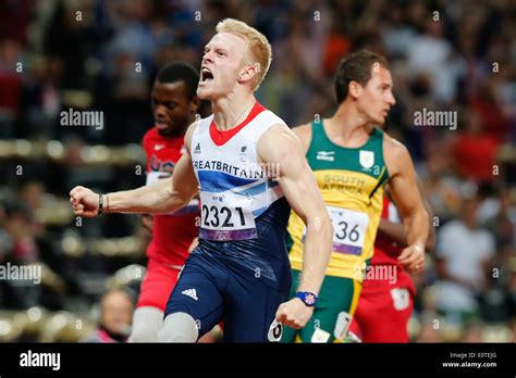 Jonnie Peacock Of Great Britain Celebrates Winning Gold Following The