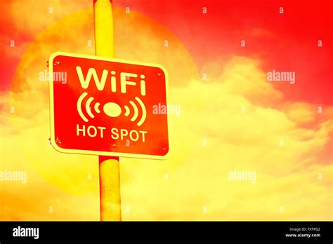 Wifi Hotspot Sign Against A Hot Red And Yellow Background Stock Photo