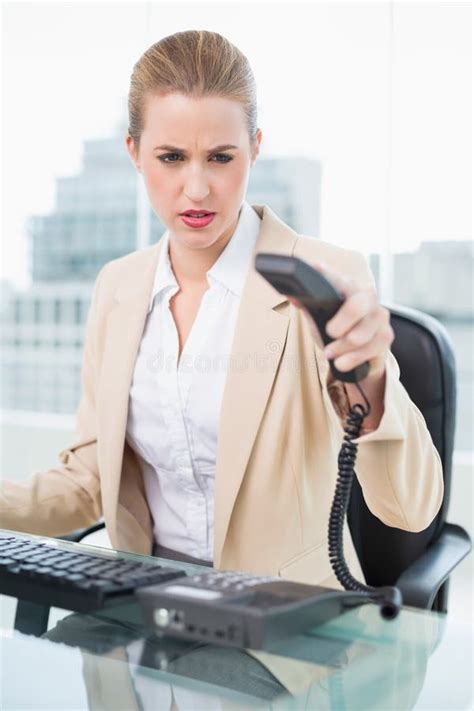 Angry Young Blonde Businesswoman Hanging Up Phone Stock Photos Free