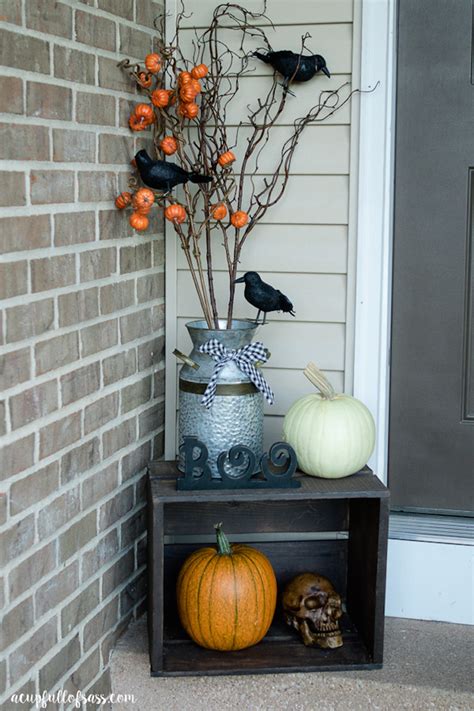 This is when scary outdoor decorations are the best kind. Halloween Front Porch Decor Ideas - A Cup Full of Sass