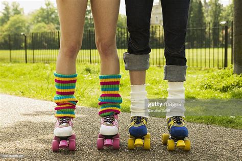 Two Young Women Wearing Roller Skates Low Section ストックフォト Getty Images