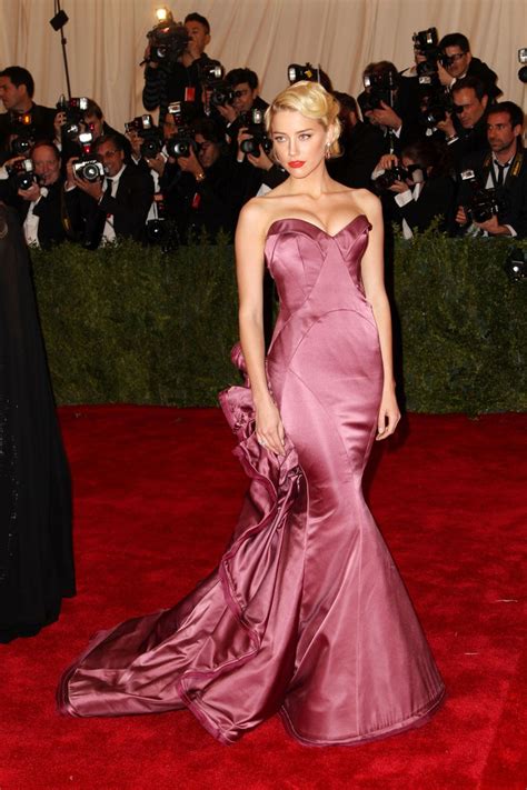 On the red carpet, heard often steps out in christian louboutin pumps, favoring the brand's classic so kate style. Amber Heard in Celebs on the Red Carpet at the Met Gala in ...