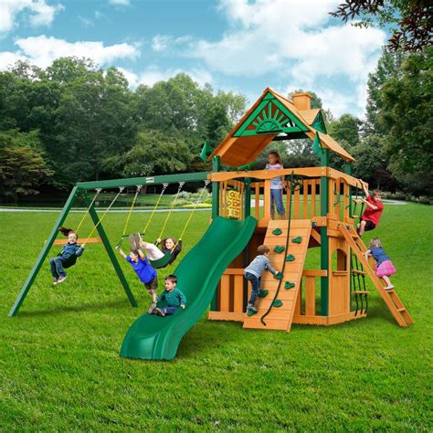 Gorilla Playsets Chateau Clubhouse Wooden Swing Set With Timber Shield