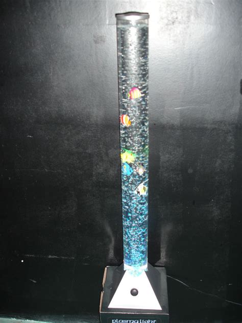 The colorful bubble tube with floating faux fish create a sensory calming experience and creative focal point to captivate a person with autism's imagination. Bubble lamp with fish - fantastic look for any home ...
