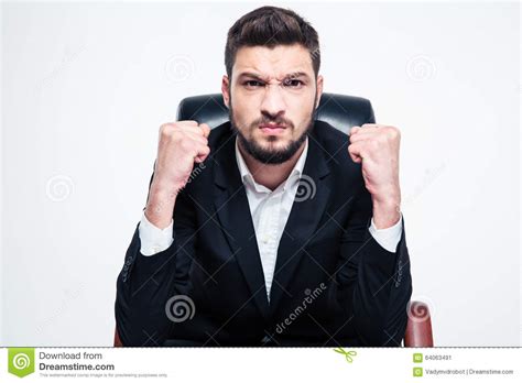 Angry Annoyed Bearded Businessman Sitting And Showing Fists Stock Image