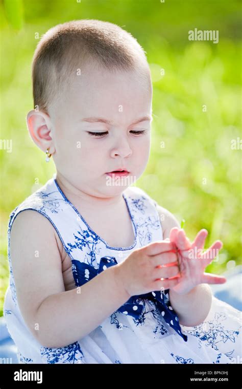 Little Baby Girl Spending Time Outdoor Stock Photo Alamy