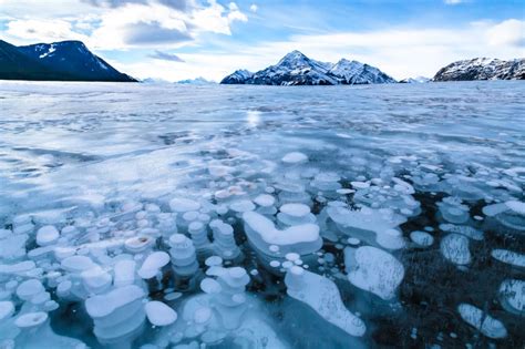 The Surreal Ice Bubbles In The Abraham Lake Canada Places To See In