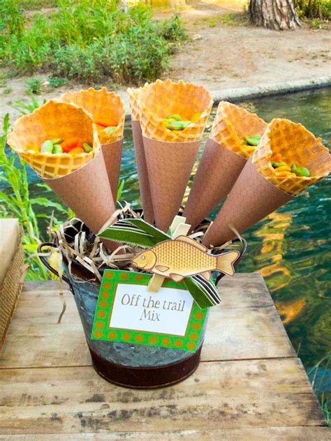 The rest of the venue was decorated with fishing nets, fish banners, painted wood fish, mini bobbers, and various fishing phrase banners scattered throughout. Gone Fishing Boy Themed Party Planning Ideas Decorations ...