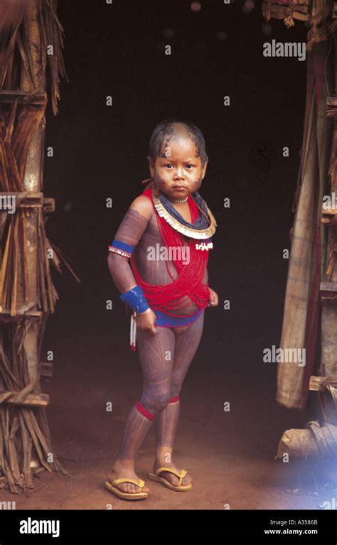 A Ukre Village Brazil Kayapo Girl With Beads And Black Body Paint Stock