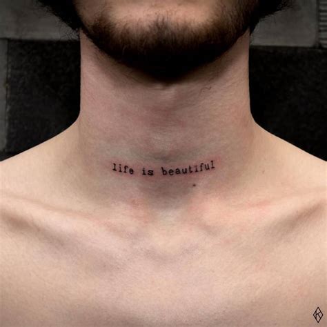 Life Is Beautiful Lettering Tattoo On The Neck