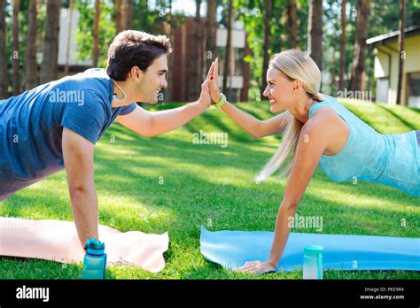 Delighted Positive Couple Being Opposite Each Other Stock Photo Alamy