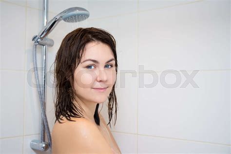 Young Naked Woman Standing In Shower Stock Image Colourbox