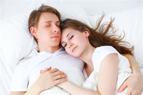 Happy Couple Sleeping In Bed At Home Stock Image Image Of Lover Cuddling 64784779