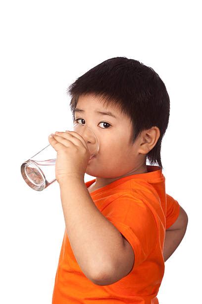 Boy Drinking Water Isolated Stock Photos Pictures And Royalty Free