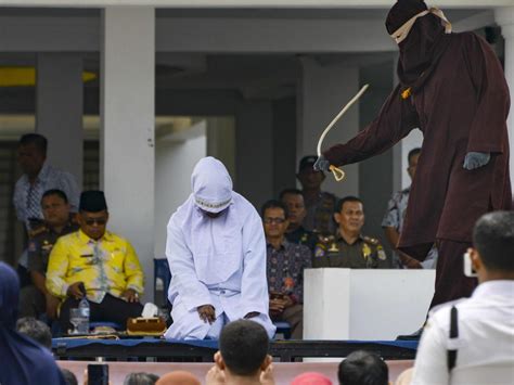Indonesia Woman Collapses As Shes Caned For ‘having Sex Outside
