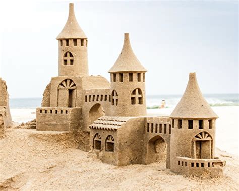 Фото пляжа замок песке 562x450