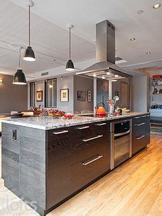 Ovens, stoves, dishwashers and wine refrigerators all compete for crucial space in it's easier to vent the exhaust fan hood when it's run it up the wall. vent hoods over kitchen island - Google Search Showing ...