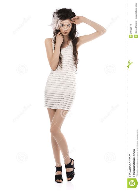 Full Body Shot Of Posing Model In White Dress Stock Photo