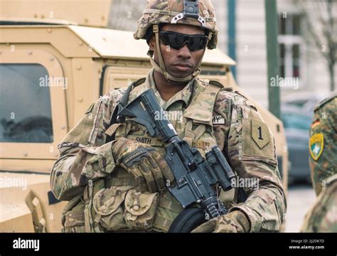 African American United States Marine Corps Soldier With Sunglasses Shotgun Or Rifle And