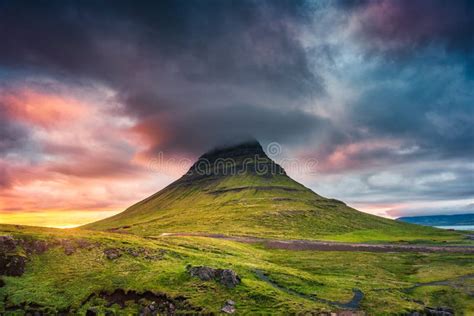 Landscape Of Sunset Over Kirkjufell Mountain With Colorful Pileus Cloud