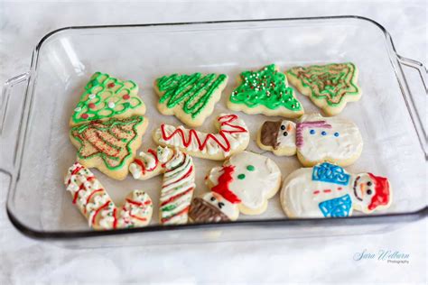 Frost each cookie and decorate with sprinkles while frosting is still wet. Christmas Sour Cream Sugar Cookies with Cream Cheese Frosting