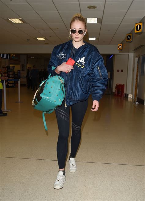 Following the ceremony, rose and kit walked out of the church hand in hand to cheers from their guests. Sophie Turner At Aberdeen airport for Kit Harington and Rose Leslie wedding - Celebzz