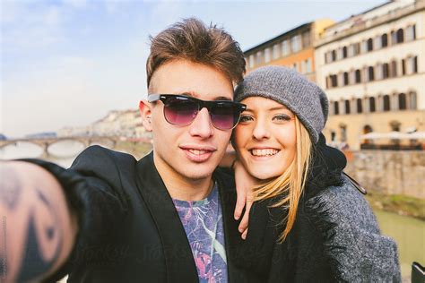 Urban Teen Couple Taking A Selfie In The Old City By Stocksy Contributor Giorgio Magini