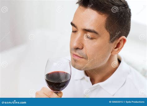 Happy Man Drinking Red Wine From Glass At Home Stock Image Image Of