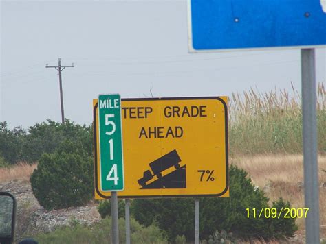 1627 m, 5339 ft) is a high mountain pass across the continental divide of the americas of the canadian rockies on the alberta/british columbia border, and lying within yoho and banff national parks. 7% Steep Grade warning sign! I-10 eastbound east of Kerrvi ...