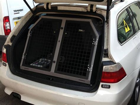 Jailbreak's first community creation, modeled by rallysubbie. TransK9/B3 BMW 5 Series Touring Dog Cage Dog Crate www.transk9.com | Mercedes benz logo, Bmw ...