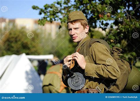 Young Male Reenactor Dressed In Uniform Of Red Army Soldiers Of World
