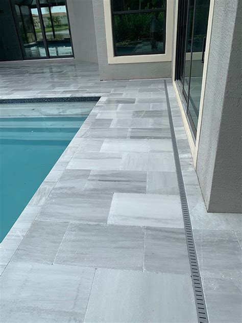 From slip resistance to heat reflectivity, pool and decking expert lucas congdon weighs in on everything you need to know about getting your most stylish, comfortable pool deck. Aspen White Pavers Marble | StoneHardscapes, LLC | Stone ...