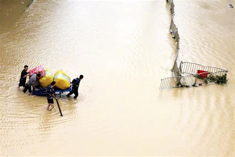China Blasts Dam To Divert Floods That Killed At Least 25 Ap News