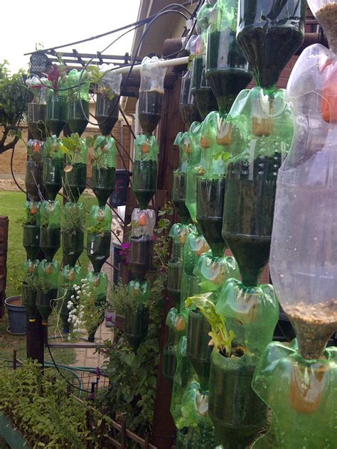 Make your own vertical planter with only $30 and a few hours of your time! Build Your Own Hanging Garden of Recycled Plastic Bottles ...