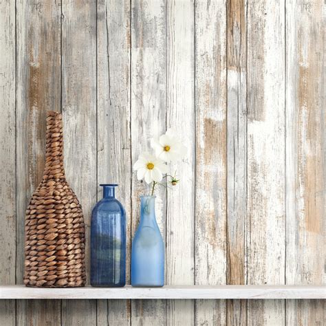 It is an easy project and cost effective. RoomMates Distressed Wood Peel and Stick Wall Décor ...