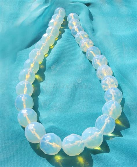 Blue Beads On Turquoise Background Stock Photo Image Of Decorative