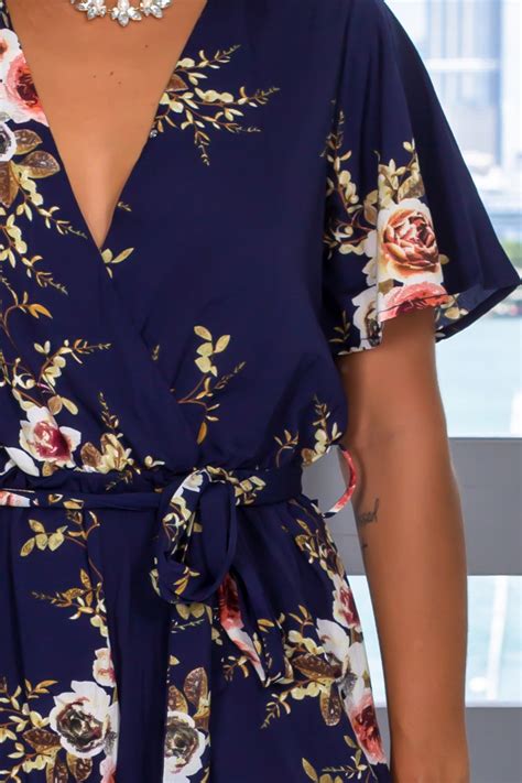 navy floral romper with sleeves rompers saved by the dress