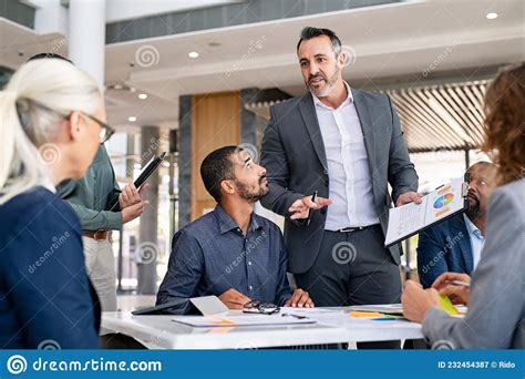 Manager Discussing In Meeting With Business Team Stock Image Image Of